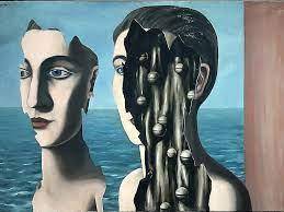 What are the two types of surrealism?  how do they differ?