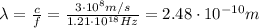\lambda= \frac{c}{f}= \frac{3 \cdot 10^8 m/s}{1.21 \cdot 10^{18} Hz}=2.48 \cdot 10^{-10} m
