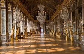 What was the theme of château de versailles, pictured above?  a. beauty and simplicity b. absolute p