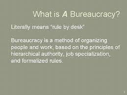 Give an example of an informal structure in a bureaucracy and explain why it might have a positive e