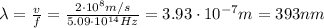 \lambda=\frac{v}{f}=\frac{2\cdot 10^8 m/s}{5.09 \cdot 10^{14} Hz}=3.93 \cdot 10^{-7} m=393 nm