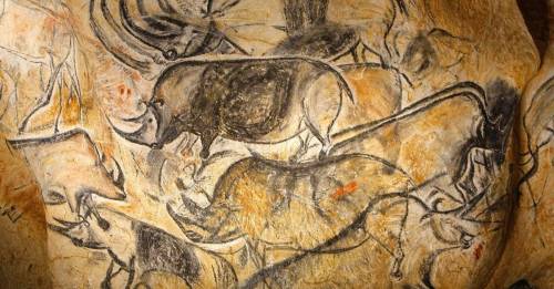 What are the major themes present in cave art?  why do you think landscape or vegetation of the time