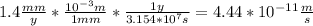 1.4\frac{mm}{y}*\frac{10^{-3}m}{1mm}*\frac{1y}{3.154*10^7s}=4.44*10^{-11}\frac{m}{s}