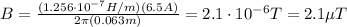 B=\frac{(1.256\cdot 10^{-7} H/m)(6.5 A)}{2 \pi (0.063 m)}=2.1\cdot 10^{-6} T=2.1 \mu T