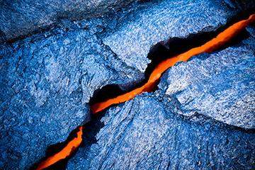 Which type of volcano is shown in the image?  a. composite volcano b. ash-cinder