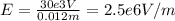 E = \frac{30e3 V}{0.012m} =2.5e6 V/m