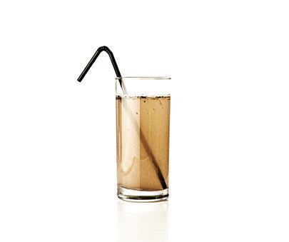 The image shows a glass of dirty water with a straw in it. which caption would most effectively conn
