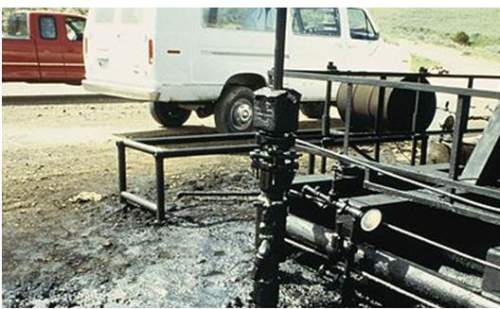 The image shows oil seeping out of an oil well. the most likely effect of this kin