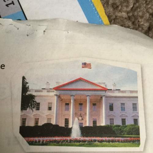 Look at the triangle on the top of the white house in the photo. describe the size and angles of the