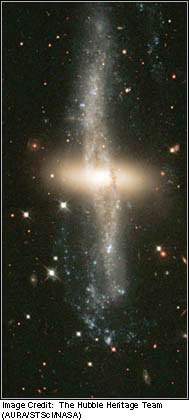 What kind of galaxy is  a) irregular b) elliptical c) spiral d) barred spira