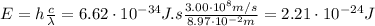 E = h\frac{c}{\lambda} = 6.62 \cdot 10^{-34} J.s\frac{3.00\cdot 10^{8} m/s}{8.97 \cdot 10^{-2} m} = 2.21 \cdot 10^{-24} J
