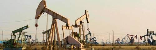 An oilfield contains 6 wells that produce a total of 1,800 barrels of oil per day. For each addition