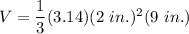 V = \dfrac{1}{3}(3.14)(2~in.)^2(9~in.)