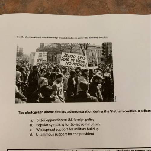 The photograph above depicts a demonstration during the Vietnam conflict. It reflects-  a. bitter op