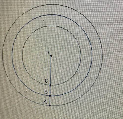 The smallest of the three circles with center D has a radius of 8 inches and CB = BA= 4 inches. What