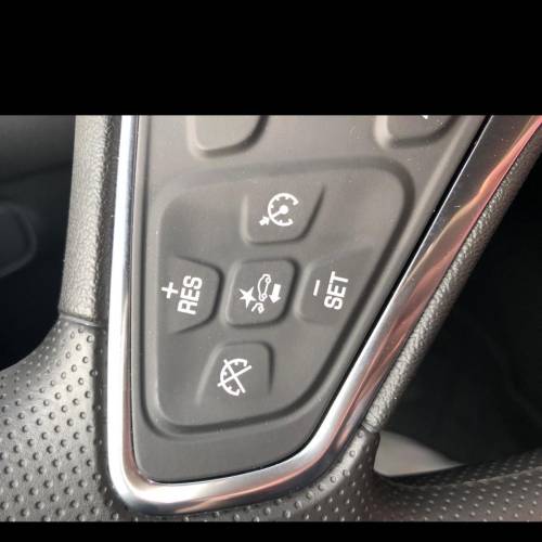 What does this middle button on the middle of my Chevrolet equinox steering wheel mean?