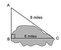 The figure shows the location of 3 points around a lake. The length of the lake, BC, is also shown.