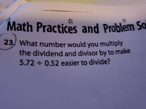 What number would you multiply the dividend and divisor by to make 5.72 ÷ 0.52 easier to divide ?