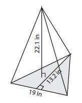 Find the volume of the triangular pyramid to the nearest whole number.