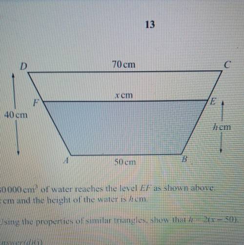The diagram shows an empty tank in the shape of a horizontal prism of length 150 cm.

The cross s