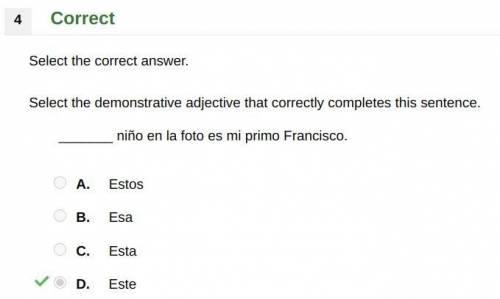 Select the demonstrative adjective that correctly completes this sentence.

_______ niño en la fot