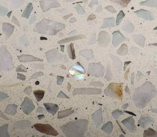 Hi, what is this sparkly/reflective rock found in flooring? not a school question, just curiosity.