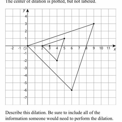 The smaller triangle is dilated to create the larger triangle. The center of dilation is plotted, b