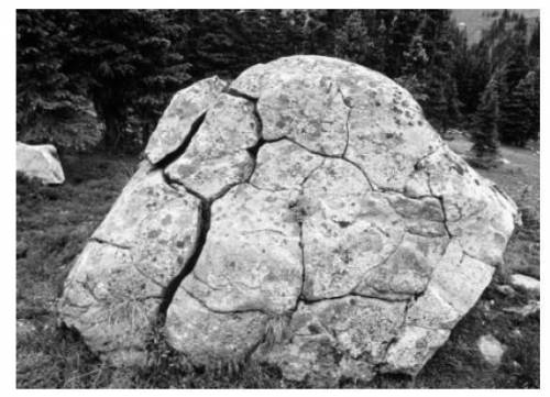 The rock in the image below has been in the same location for as long as recorded history. Which pr