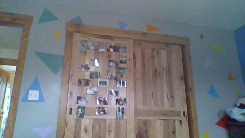 SO how does my wall look? it needed an update so I added pics to my closet door, and my wall has tr