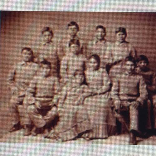 Question: How does this photo illustrate the problems faced by American Indians at boarding

schoo