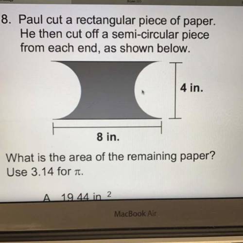 Paul cut a rectangular piece of paper. He then cut off a semi-circular piece from each end, as show