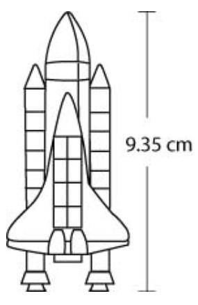 Monika has a model of the space shuttle. The height of the model is 9.35 centimeters, as shown.

T