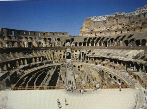 Which famous Roman structure do you see pictured here?

A. The Amphitheatre 
B. The Colosseum 
C.