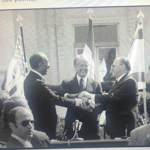 A. The main leaders who met at Camp David are in this picture, what were

their names and what cou