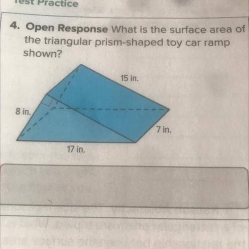 What is the surface area of
the triangular prism-shaped toy car ramp
shown?