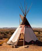 A tepee has a base of 19.5 feet and a height of 16.8 feet. The tepee can hold approximately ___ cub