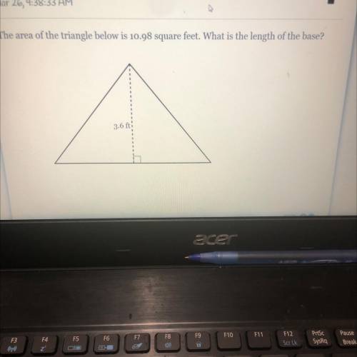 ￼
The area of the triangle below is 10.98 square feet. What is the length of the base?