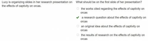 Lucy is organizing slides in her research presentation on the effects of captivity on orcas.

What
