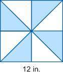 Brittney sewed together fabric triangles to make the quilt square shown below.

How much fabric di