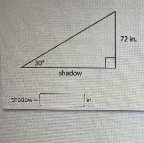 The sun shines at a 30° angle to the ground. To the nearest inch, how long is the shadow cast by a