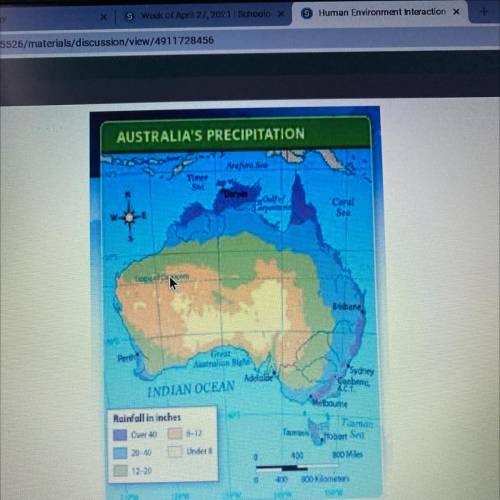 Based on the precipitation map, which part of Australia might produce few crops and why?