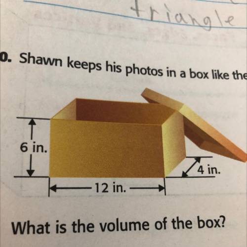 Shawn keeps his photos in a box like the one shown.
What is the volume of the box?