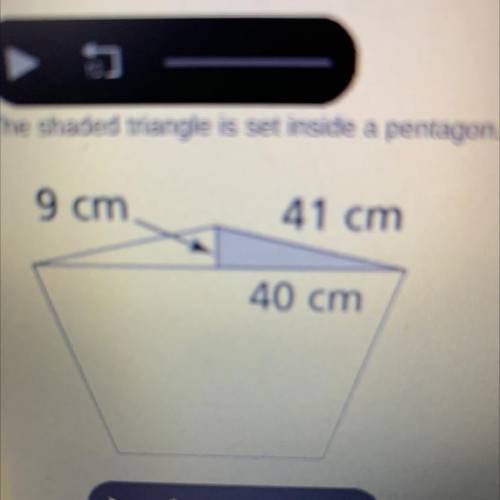The shaded triangle is set inside a pentagon. What type of triangle is the shaded triangle?