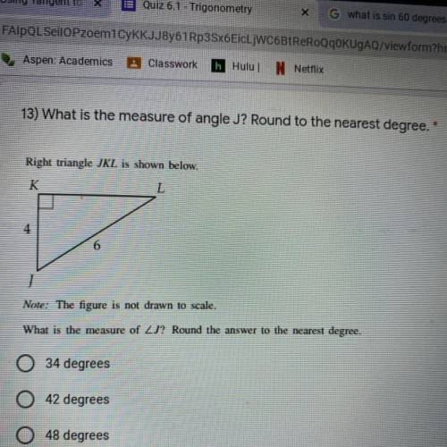Q: “What is the measure of angle J? Around to the nearest degree”

Look at the photo i attatched !