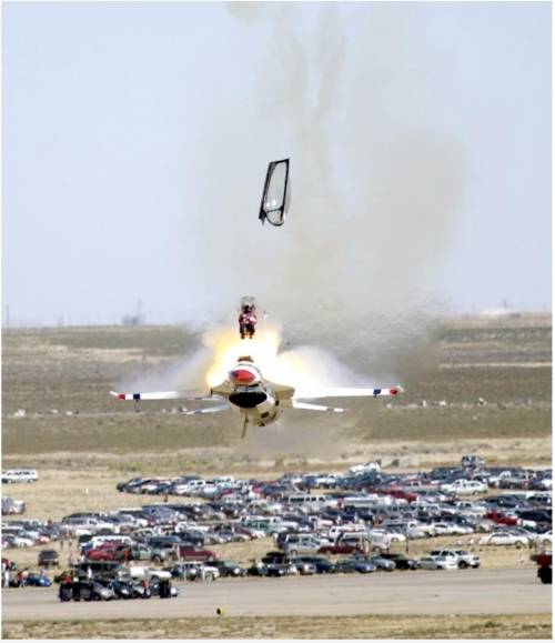 The ejection seat has an acceleration of 8gees (8xgravity or ~80m/s/s). He has a mass of 70kg. The