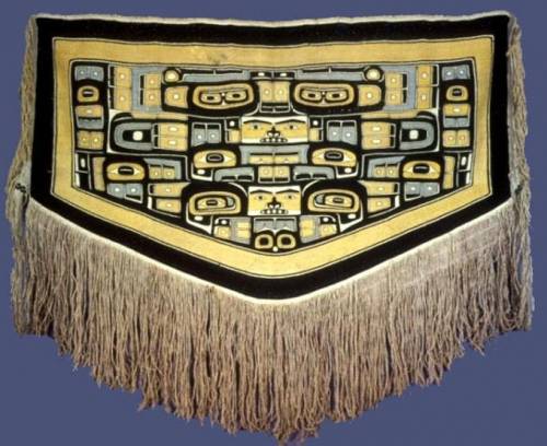 How does the chilkat blanket show that the native americans were dependent on their cultural area?