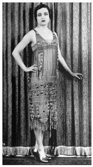 This is a picture of a woman from the 1920s.

In the postwar era, women’s style and clothing becam
